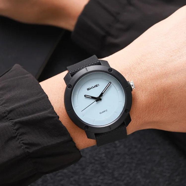 SKMEI 2557 Simple Unisex Couple Watch 50m Life Waterproof Quartz Watch(Black Case Blue Dial)